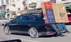 Görüntüler Urfa'dan lüks otomobilin bagajına TV taşıdılar