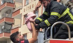 Ceylanpınar’da korkutan yangın: İtfaiye Eri bir Bebeği Kucağında İndirdi